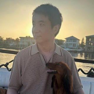 Xiang Shi with a dachshund